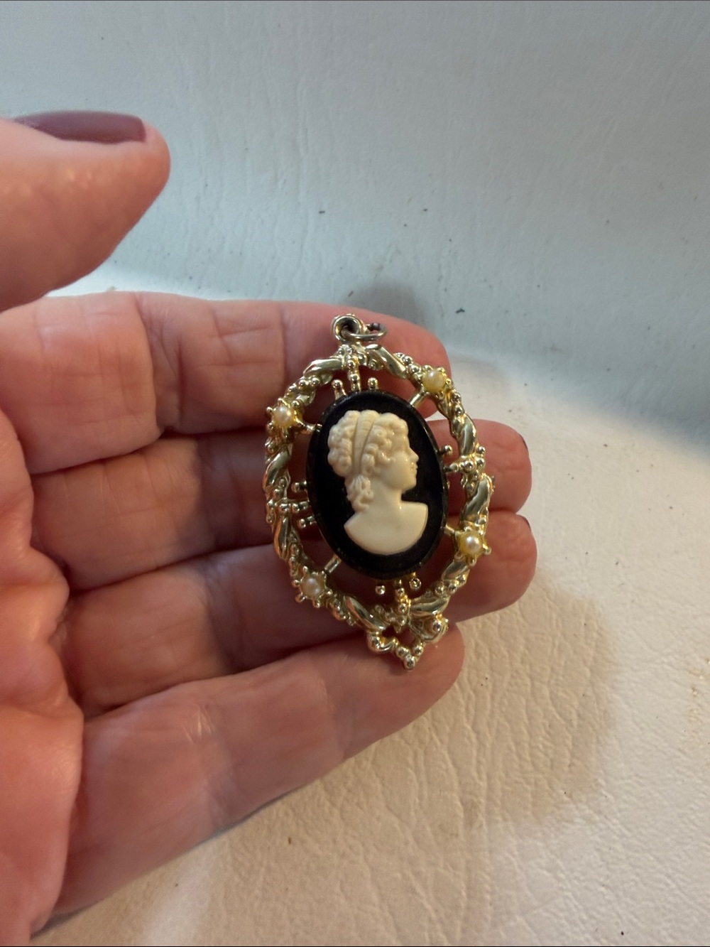 Gold toned Cameo Pendant with Black Background